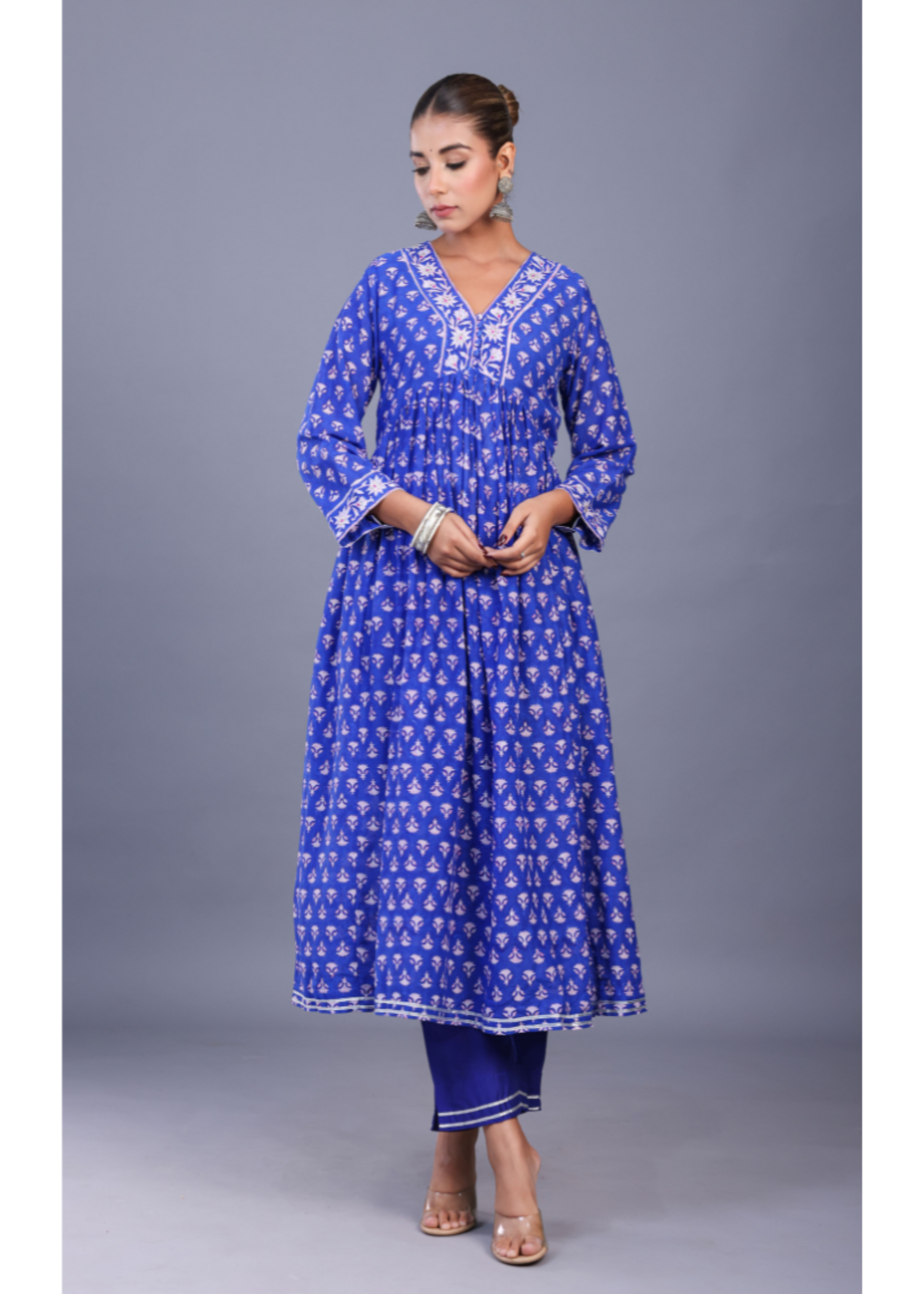 Traditional royal blue kurta dupatta set featuring floral block prints, hand embroidery, and festive design details.